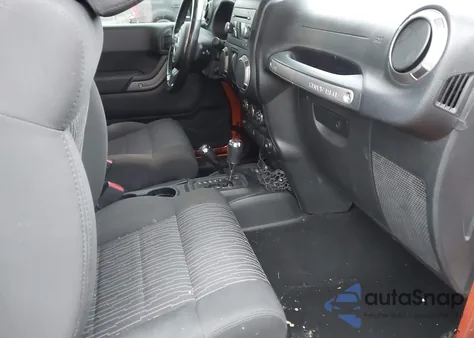 2011 Jeep Wrangler Sport z USA, uszkodzony, nr VIN 1J4AA2D18BL502847